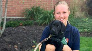 Hamilton District student Grace with her dog trainee Archer