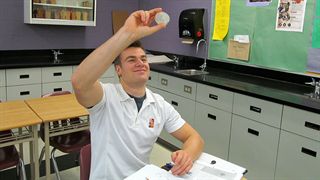 Hamilton District Christian High student working in lab