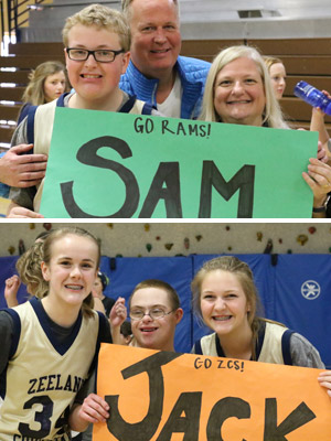 Fans and players with signs