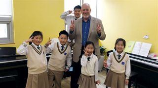 Joel Westa with Korean students